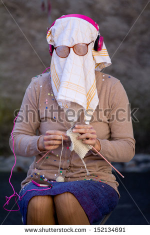 stock-photo-aurillac-france-august-a-blind-elderly-woman-is-knitting-as-part-of-the-aurillac-152134691