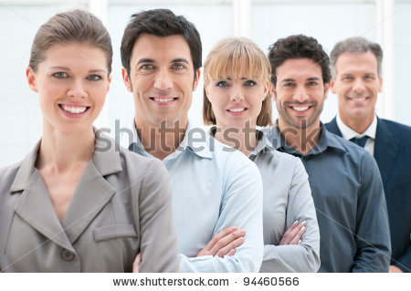 stock-photo-happy-smiling-business-team-standing-in-a-row-at-office-94460566